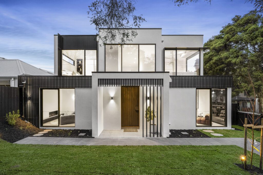 Modern luxury facade with clean lines, glass and premium materials